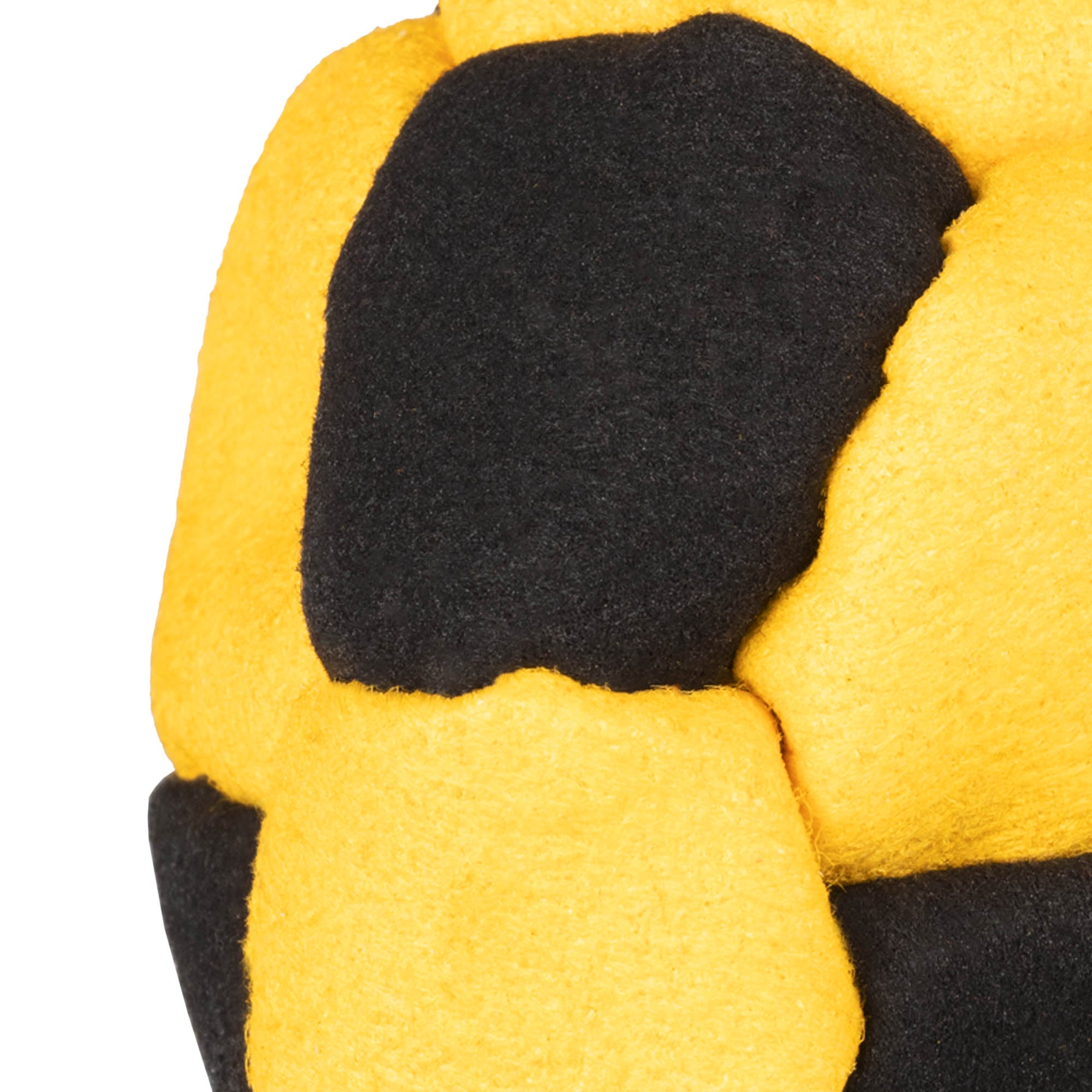 Yellow and black hacky sack close up stitching