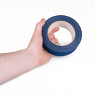 Blue tape in hand