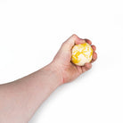 Oddballs bounce juggling ball yellow in hand