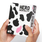 herd mentality box in hands