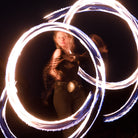 performer with fire poi